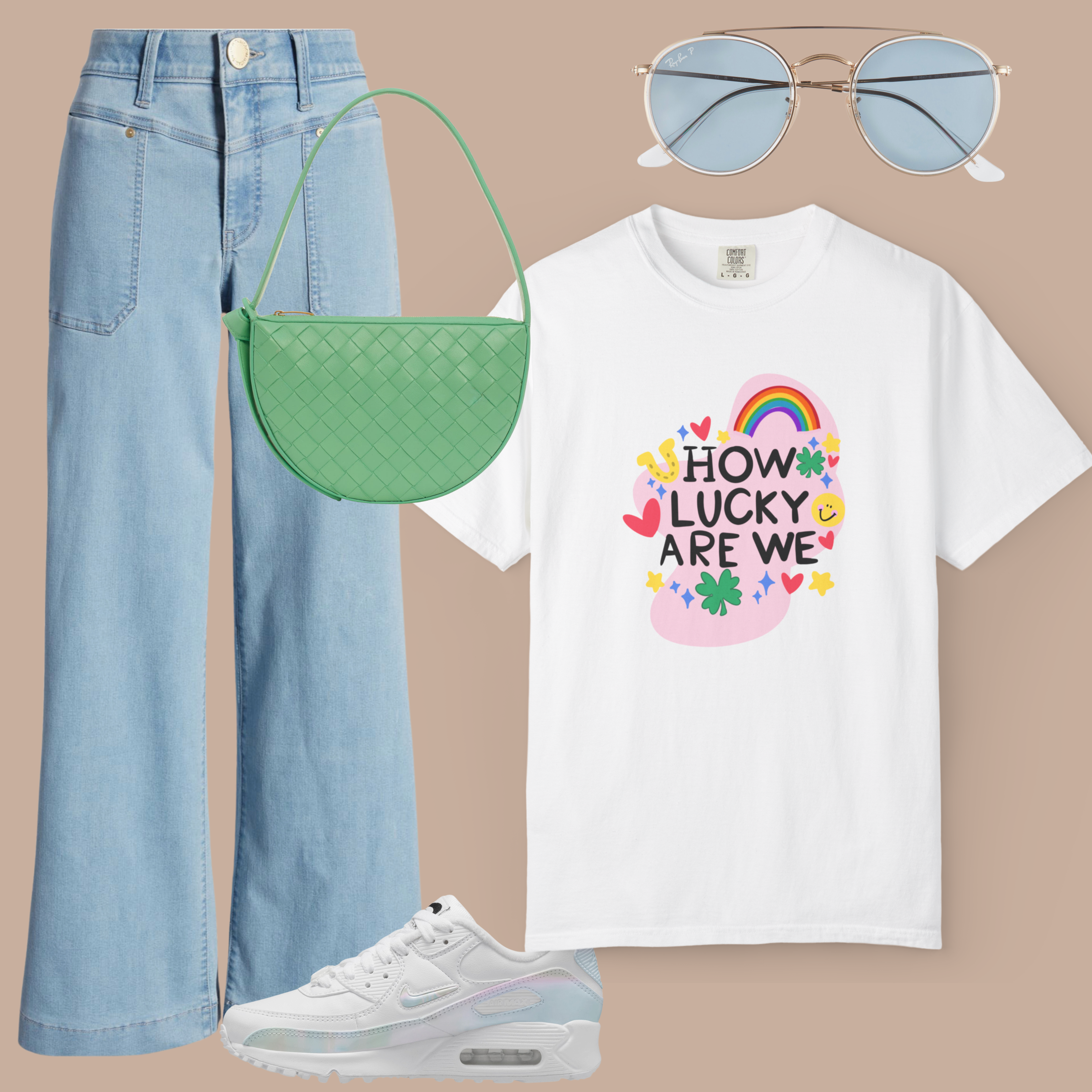 White Comfort Colors t-shirt with colorful “How Lucky Are We” graphic, styled with light-wash jeans, white sneakers, green purse, and blue sunglasses.