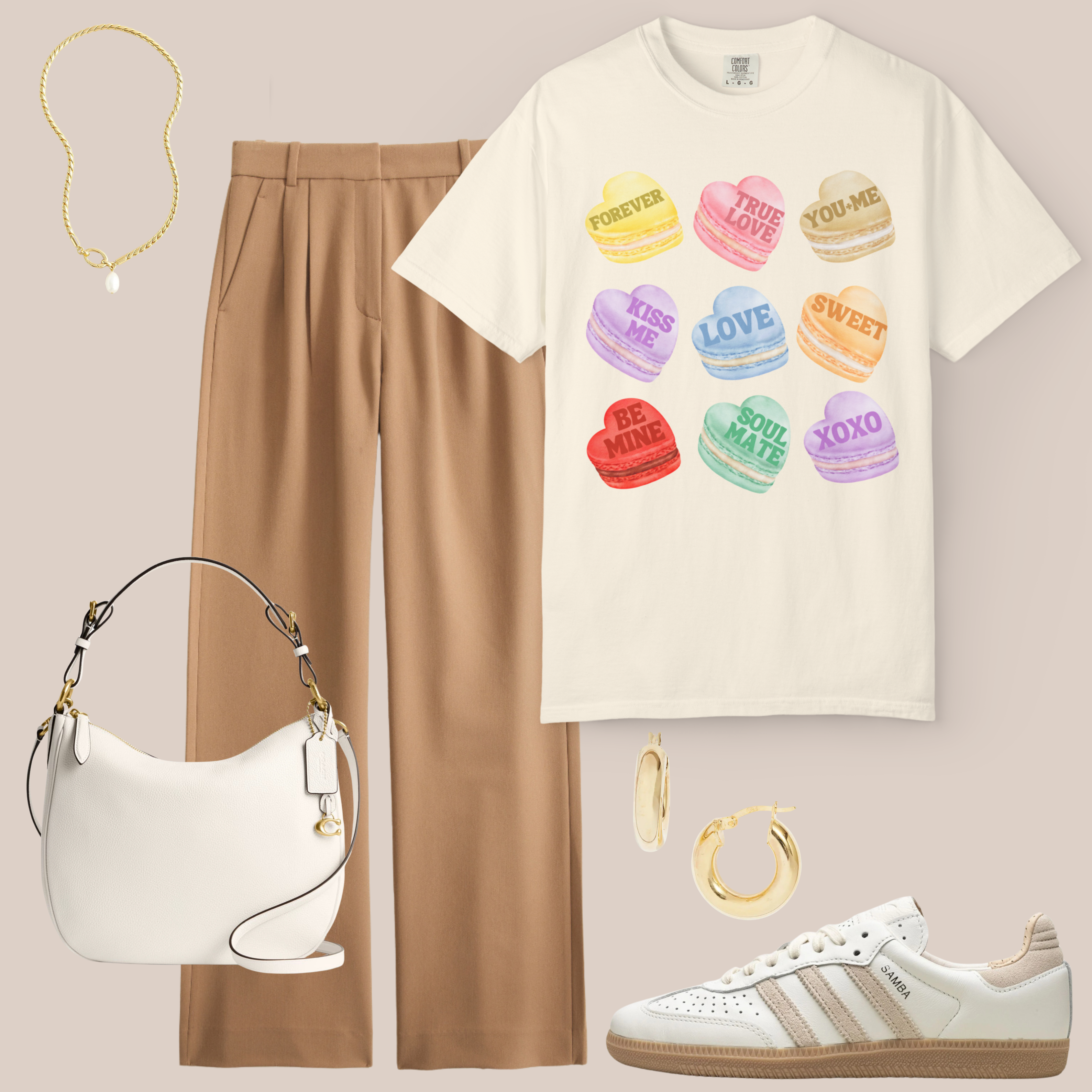 Cream Comfort Colors tee with colorful macaron hearts and love sayings, styled with tan trousers, white sneakers, gold hoops, and white shoulder bag.
