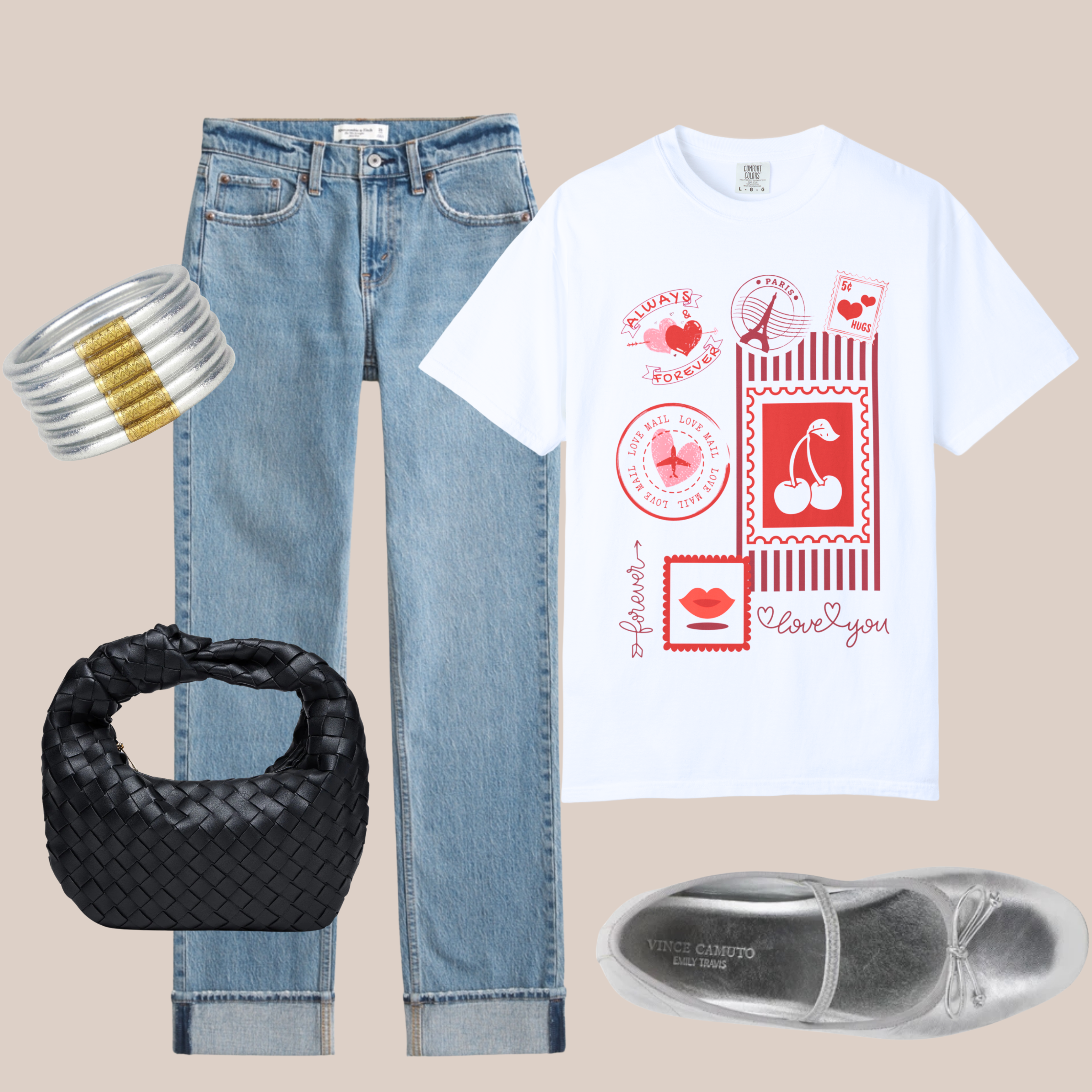 White Comfort Colors t-shirt with red love stamp graphics including cherries, Eiffel Tower, and lips. Styled with light-wash cuffed jeans and silver flats.