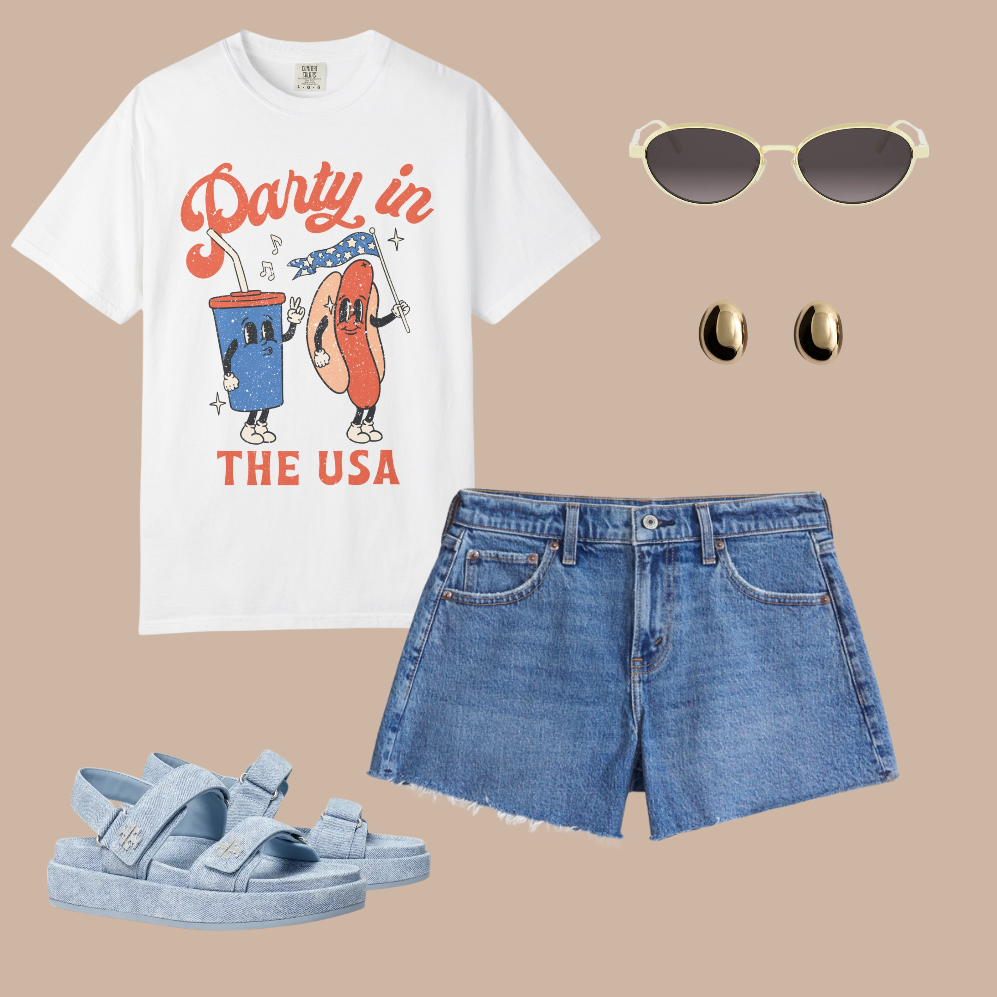 White vintage-style graphic t-shirt featuring a dancing hot dog and soda with “Party in the USA” text, styled with denim shorts, gold earrings, and blue sandals