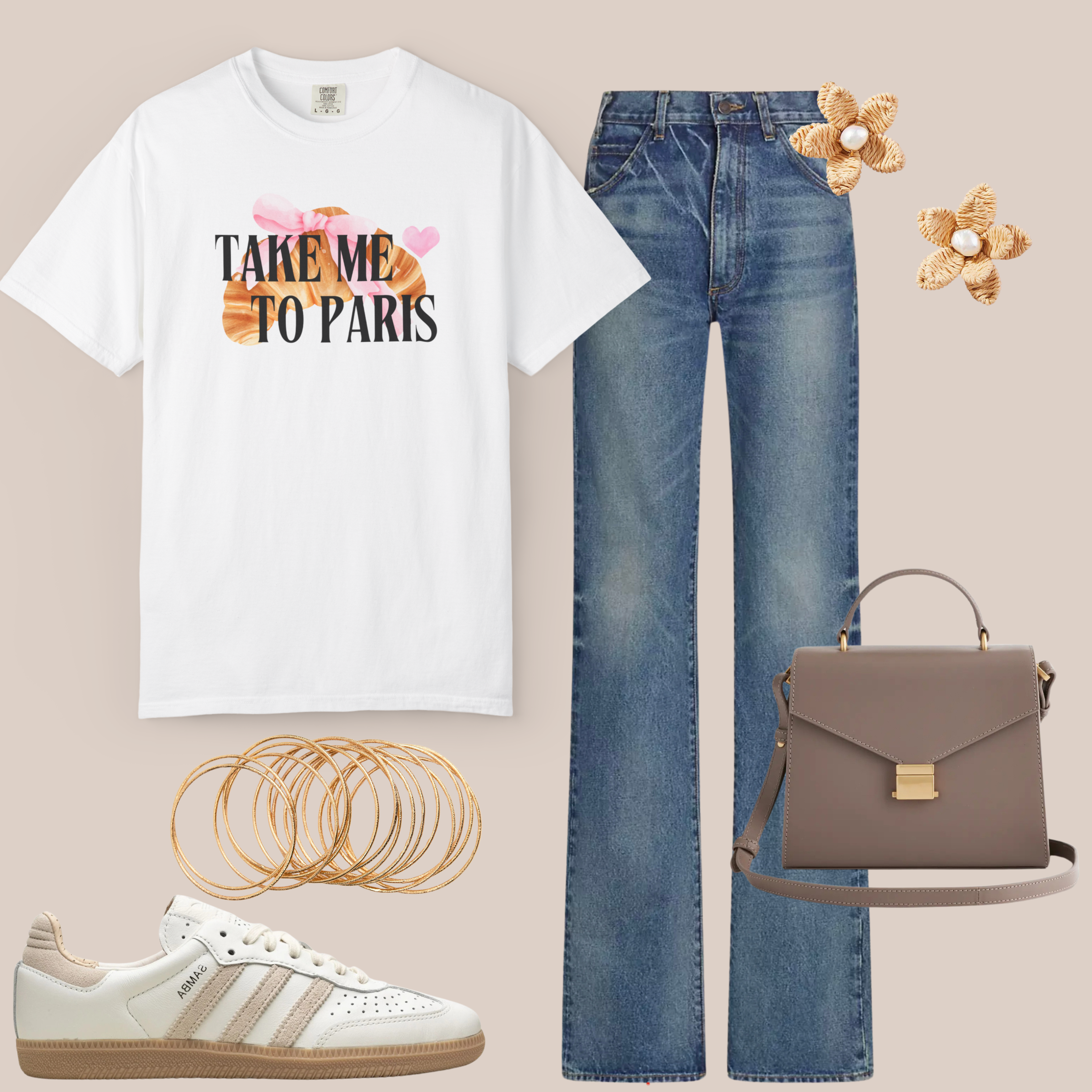 White Comfort Colors t-shirt with “Take Me to Paris” text and croissant graphic, styled with denim jeans, gold bangles, taupe handbag, and white sneakers.